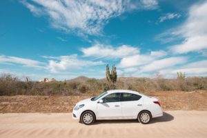 white rental car on vacation